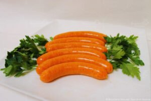 Saucisses de poulet au curry